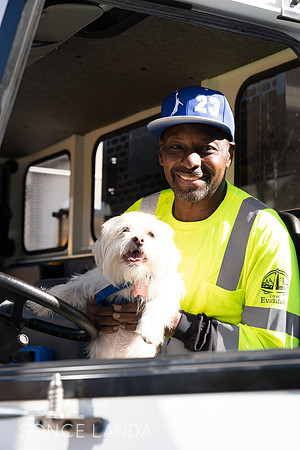 Rescue dog drives garbage truck with Evanston City Worker